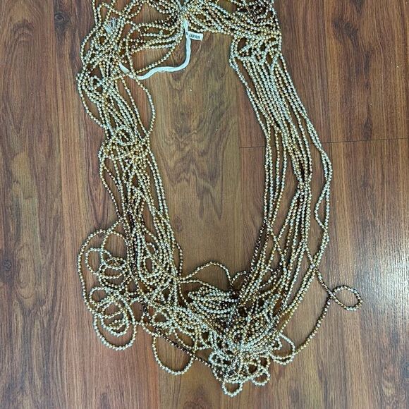 12 strands vintage made in Japan gold plastic beads 60 inches each around - Picture 1 of 4